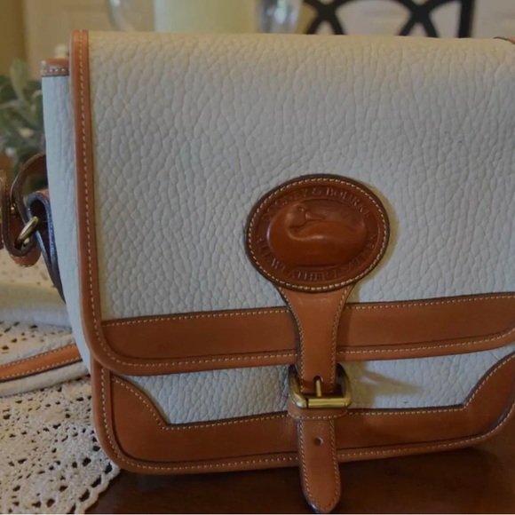 Dooney & Bourke Handbags - Dooney & Bourke white signature logo purse